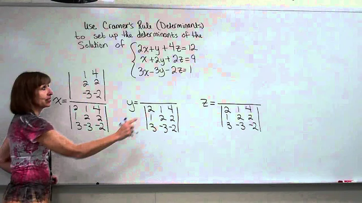 Setting up the determinants to solve a three equation three variable system of equations