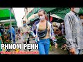 Walking tour in Phnom Penh 2021 at traditional market, Cambodian food tour