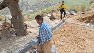 Morteza and Ali work in blocks and Falkenaz bakes bread