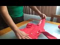 Como dobrar casaco de bebê com capuz