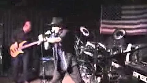 Michael Crouch and the Coyote Moon band performing...