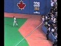 The fan in the white with the hands of stone versus Raul Mondesi