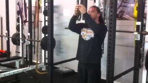 Standing band crunches