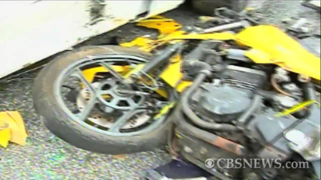 Motorcycle crashes into parked car - YouTube