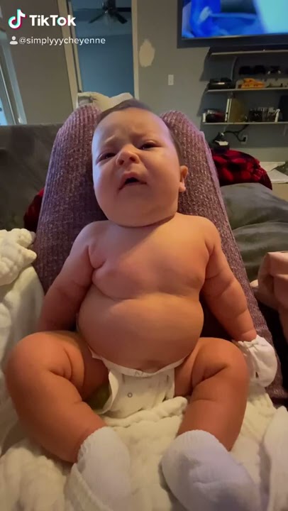 Cheeky Baby Tries To Take His Diaper Off 