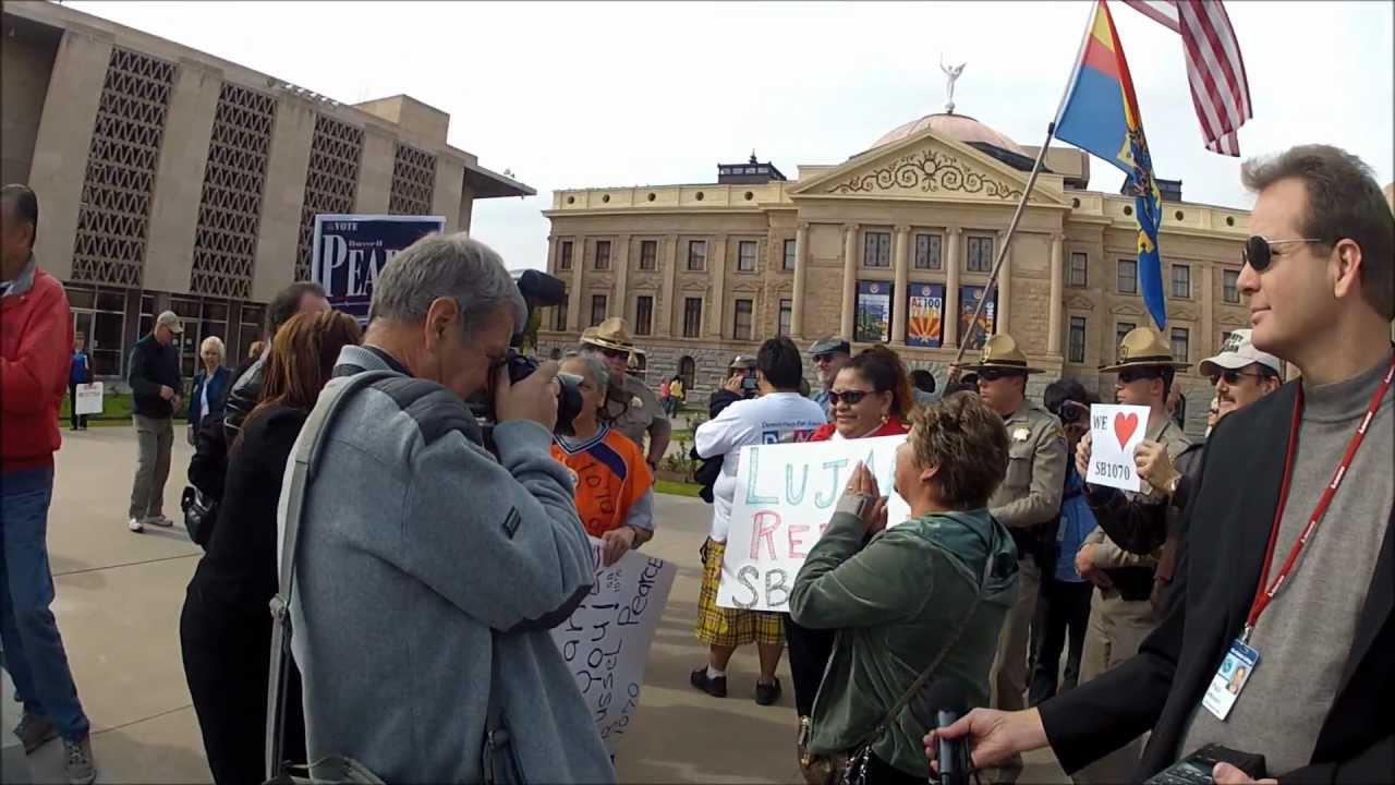 SB1070 supporters at Repeal SB1070 Rally 1-23-12.wmv