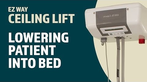 EZ Way Ceiling Lift Usage: Lowering the Patient into a Bed