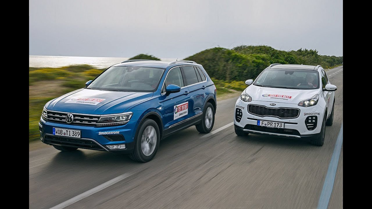 Kia volkswagen. Sportage 2.4 vs Tiguan. Тигуан Спортейдж. Фольксваген Тигуан и Киа Спортейдж. Kia Sportage Volkswagen Tiguan.