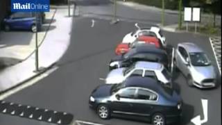 CCTV Dozy driver smashes into TWO PARKED cars