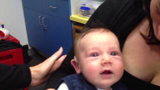 Baby`s first hearing aids aged 7 weeks old  Our gorgeous baby boy
