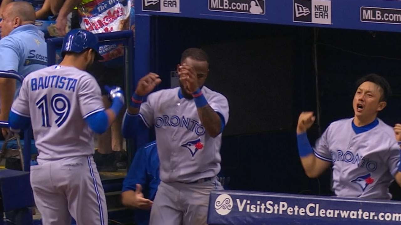 Munenori Kawasaki and Jose Bautista of the Toronto Blue Jays