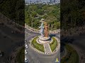 ✨ Radha Krishna Statue at Night 🌙 | Beautiful Aerial Drone View | City Landmark in Lights