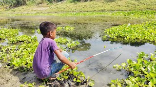 fishing video | asian traditional smart boy hunting/catching fish by fish hook in the village river