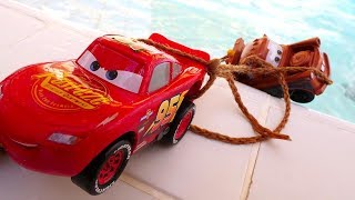 Lightning McQueen and Mater the tow truck: Toy Cars for kids at the water park.