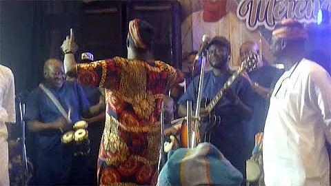 Moment Taye Currency Display with K1 D Ultimate Wasiu Ayinde Band Members on Stage