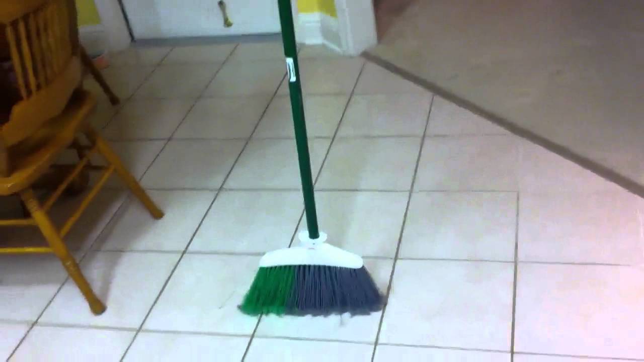 broom standing up broom standing up