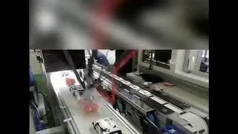 Cover lid plastic lid robot hand feeding placing machine running video