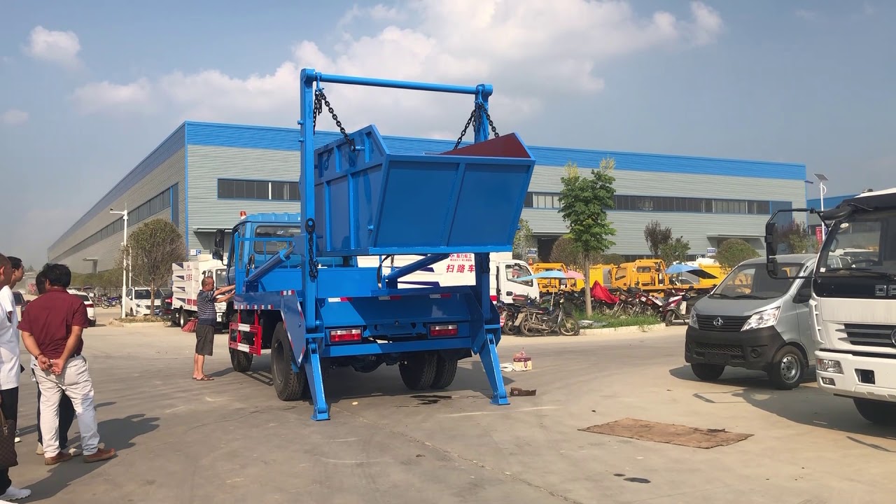 swing arm garbage truck