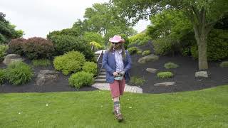 Outrageous Flower Man Steals the Show. Fanny pack and all.