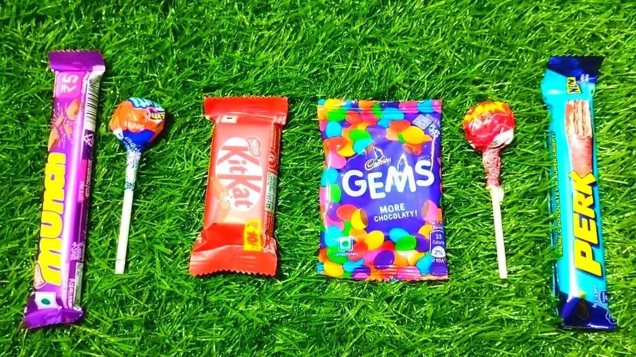 Asmr most popular candys / some lots of colorful rainbow lollipop candy /  unpacking chocolate eat 