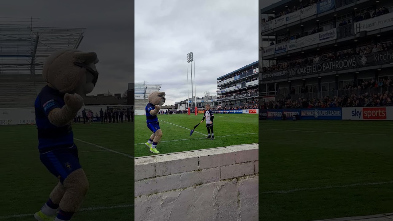 my son riley staton having dance off with Wakefield trinity mascot before leopard game lol