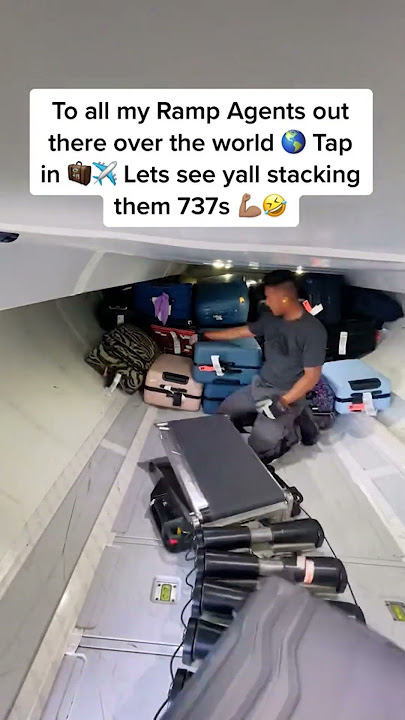 LOADING UP PLANE LUGGAGE