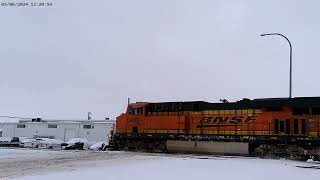 Snowy, cold and fast! BNSF empty coal train at East Dickinson racing west for more electric fuel!!