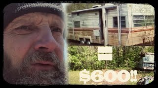 Camper scraping for money