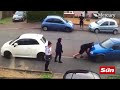 Incredible moment bodybuilder lifts up and moves car as part of bitter neighbourhood parking row