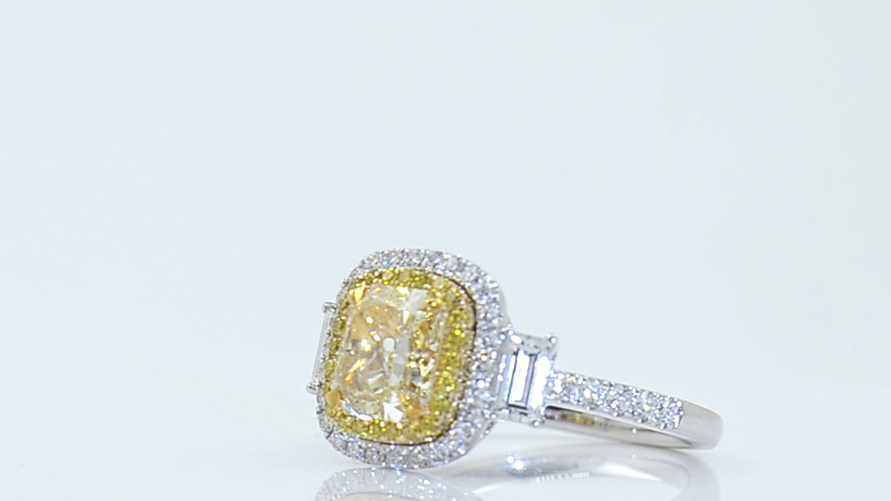 2.10 CT FANCY YELLOW DIAMOND RING