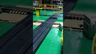 Fun with HO Scale Trains vs Slotcars at railroad crossing