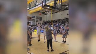 Blind basketball player makes shot in front of 2,500 fans