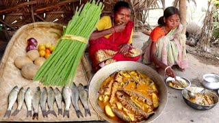 farm fresh drumstick curry with small fish cooking by our santali tribe grandma||rural village India