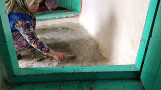 plaster plaster from ladys hand /old village house renovation cleaning paint whitewsh dont sayl cant