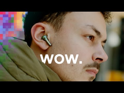 Video: Wie verbindet man iWorld Bluetooth-Ohrhörer?