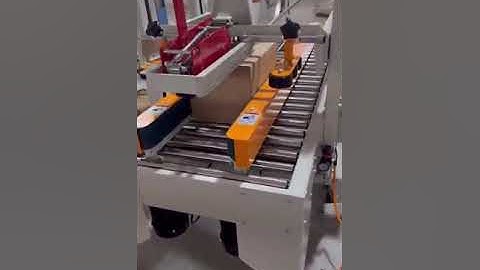 Automatic carton flaps folding sealer. #packing #carton #ecommerce #warehouse #machine
