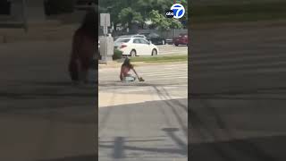 Suspect waving gun struck by police car in New York screenshot 4