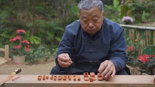 Grandpa Amu made a wooden heart-shaped lock in which you can put ring jewelry