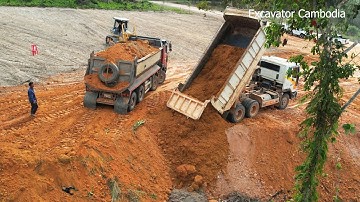 New Project Processing Dump Truck Unloading Soil And Heavy Dozer Moving Soil To Slope Widening Road