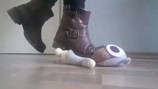 Girl Crushing Stuffed Animal With Boots