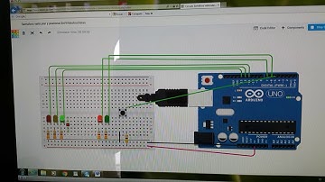 Simulación de un semáforo vehicular y uno peatonal en Arduino.
