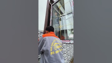 Cửa Nhôm Xingfa vân gỗ trắc kết hợp kính hộp nan trang trí hot 2025