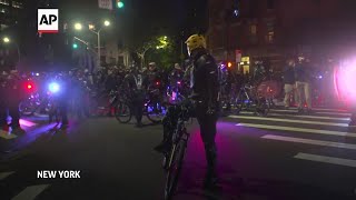 Arrests after protesters set fires in NYC