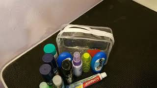 Packing your liquids for traveling without checking your luggage. TSA approved 3-1-1 bag