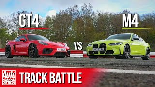 BMW M4 Competition vs Porsche Cayman GT4: Steve Sutcliffe track battle | Auto Express