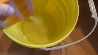 DRAFT Pouring Baking Soda into Bucket of Water