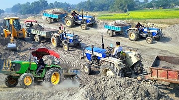 JCB 3dx backhoe eco expert loading mud into tractor arjun, Mahindra, and sonalika