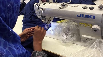 Main & size label attach by Single Needle Lock stitch machine