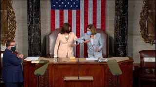 Kamala Harris and Nancy Pelosi take their place behind the podium for President Biden's speech