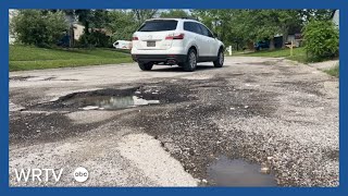 Pike Township neighborhood pleads for city to fix potholes